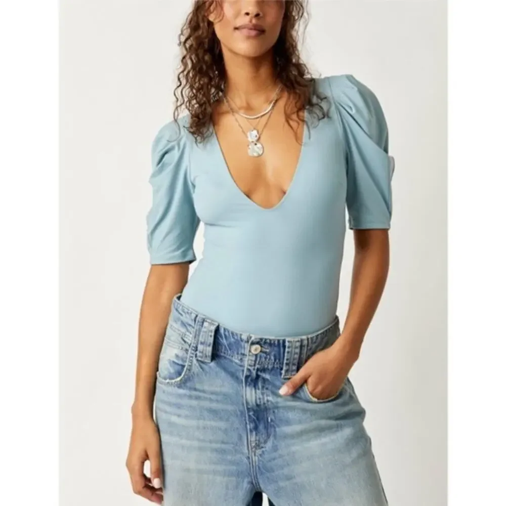 Free People Va Va Voop Bodysuit Blue Puff Sleeve Deep V NWOT Size M - Picture 1 of 6